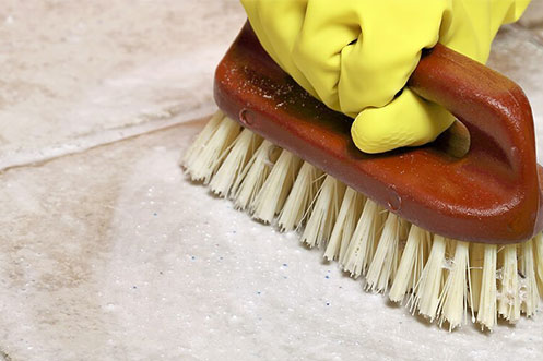 Floor cleaning with the help of brush | Buckway Flooring